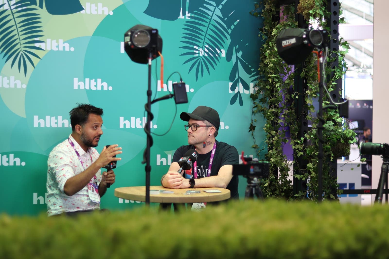 Shubs Upadhyay interviewing a guest at HLTH Conference